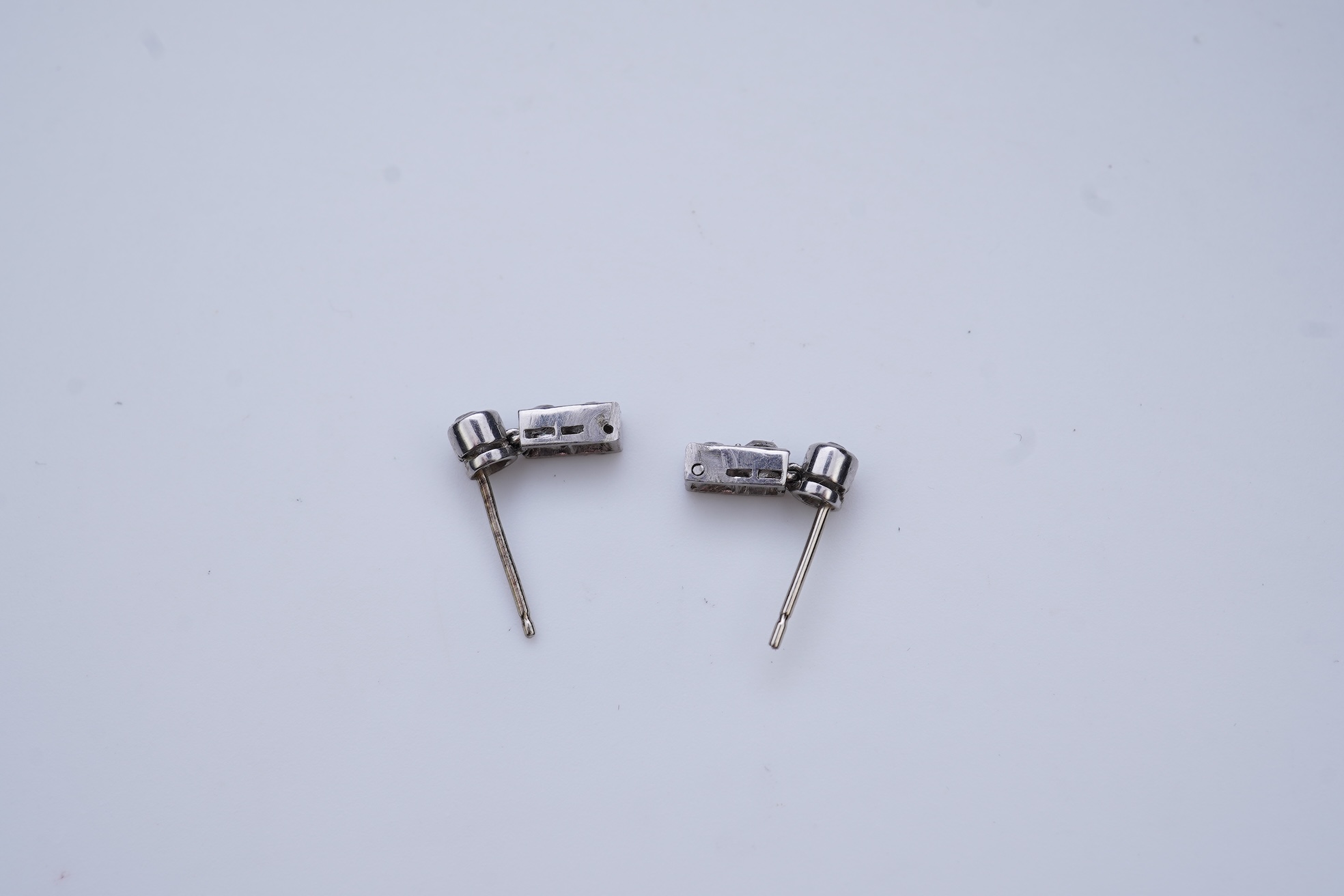 A pair of diamond earrings, early 20th century composite
